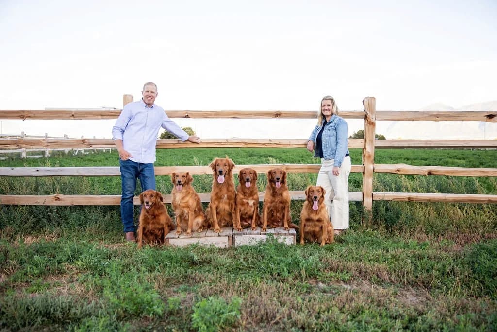 Tyce and Rachel Erickson with their golden retrievers